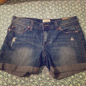 Destroyed denim shorts